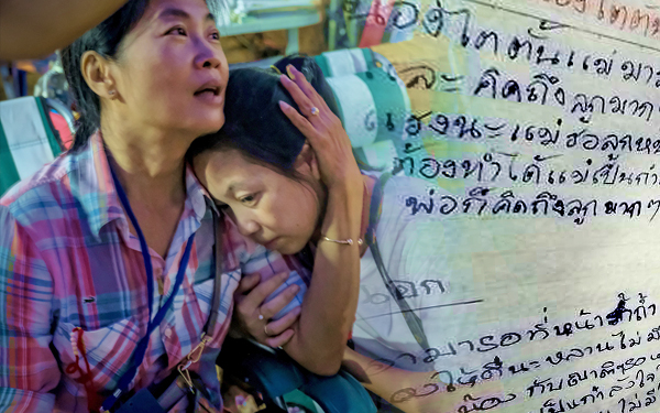 thai family receive letter from kids stuck in cave